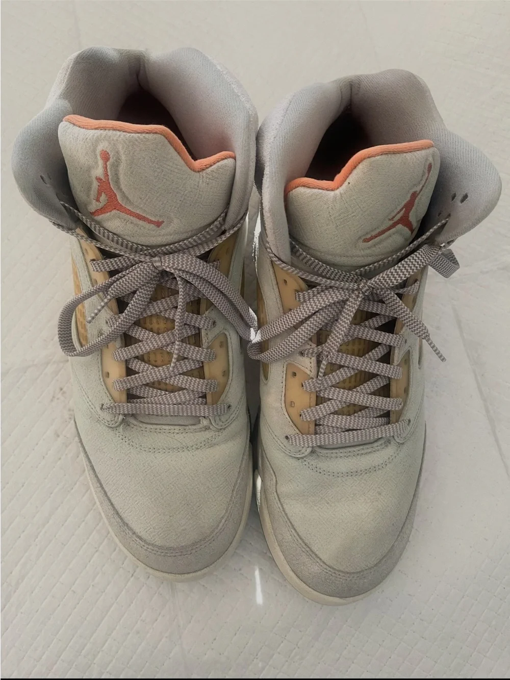 Jordan High-Top Sneakers in Light Gray with Peach Accents